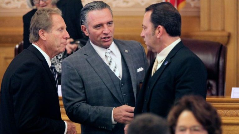 In Kansas, tensions mount between Democrat governor and GOP legislature over surplus plans