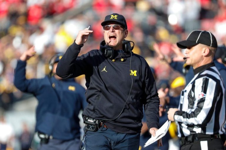 Harbaugh accepts suspension as Michigan drops case against Big Ten