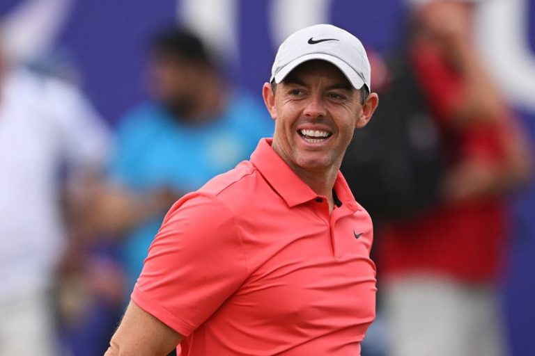 Rory McIlroy’s shot misses the green, instead lands in fan’s lap