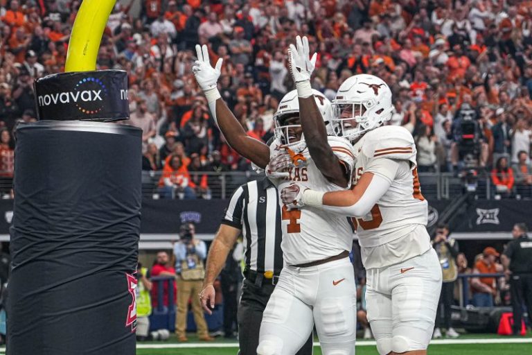 Texas makes playoff case by beating Oklahoma State for Big 12 title