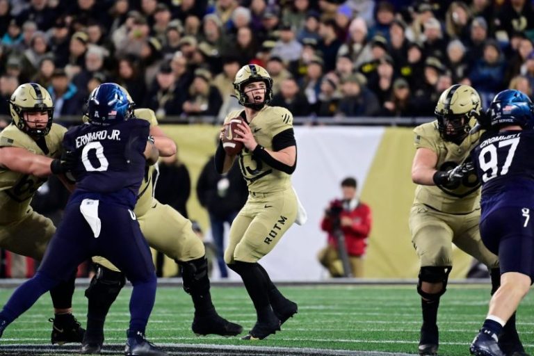 Army holds off Navy comeback to win in wild finish