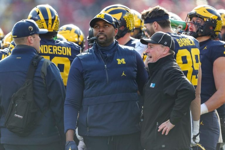 Michigan hit with NCAA sanctions for football recruiting violations
