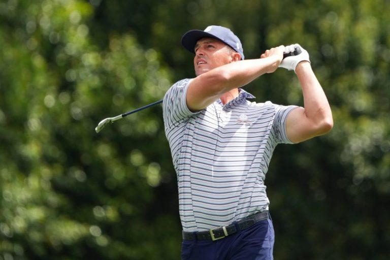 Masters Round 1 recap: DeChambeau leads, play suspended