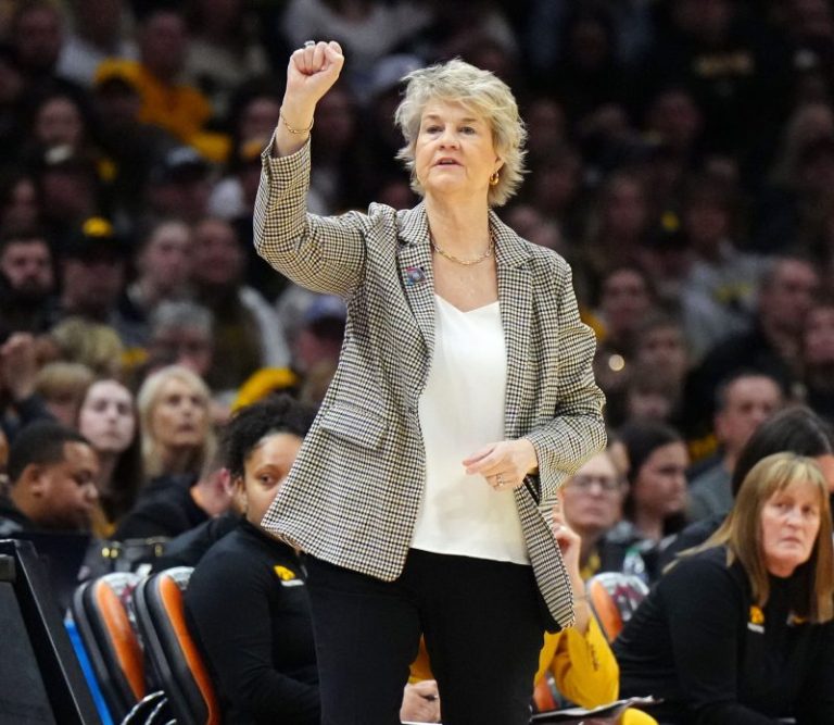Iowa women’s basketball coach retires after two straight NCAA title games