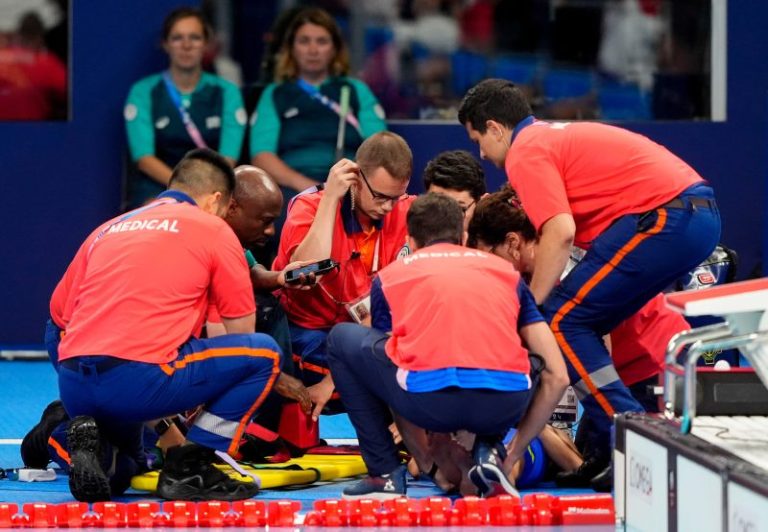 Swimmer under medical assessment after collapsing following race