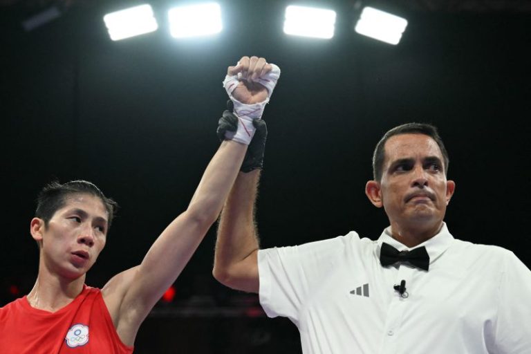 Olympic boxer enters ring amid stirring gender eligibility controversy
