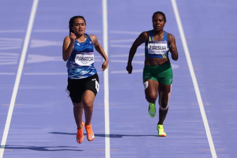 Marathon runner from Solomon Islands competes in 100m