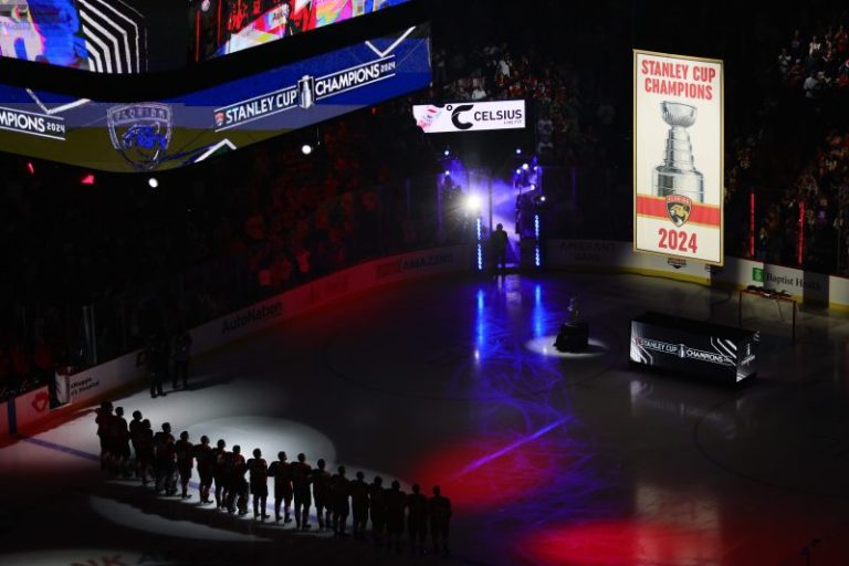 Panthers raise Stanley Cup banner, down Bruins in opener