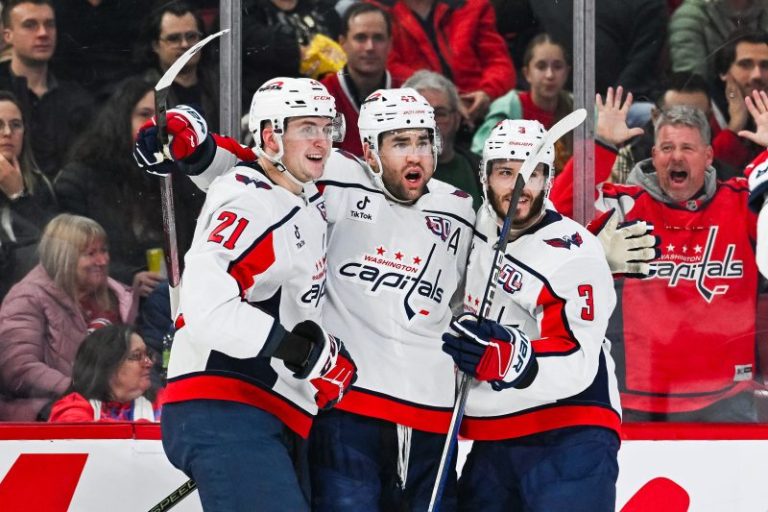 NHL player hit by puck, scores twice with badly swollen face