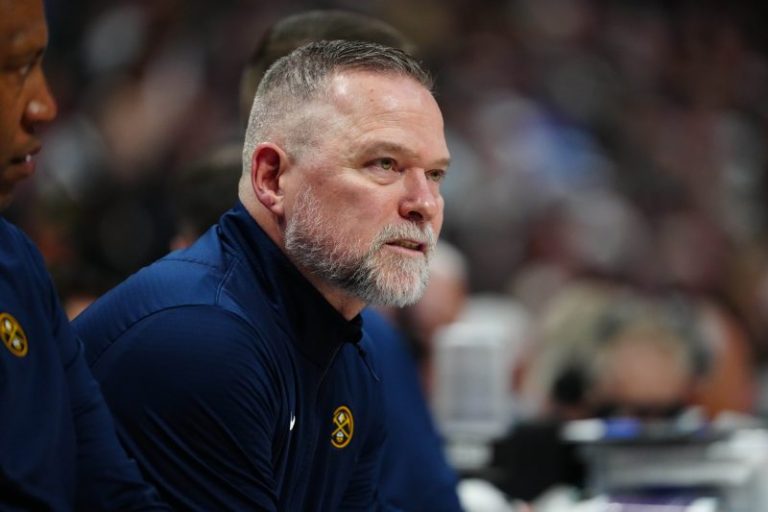 Why did the Nuggets fire Michael Malone right before playoffs?