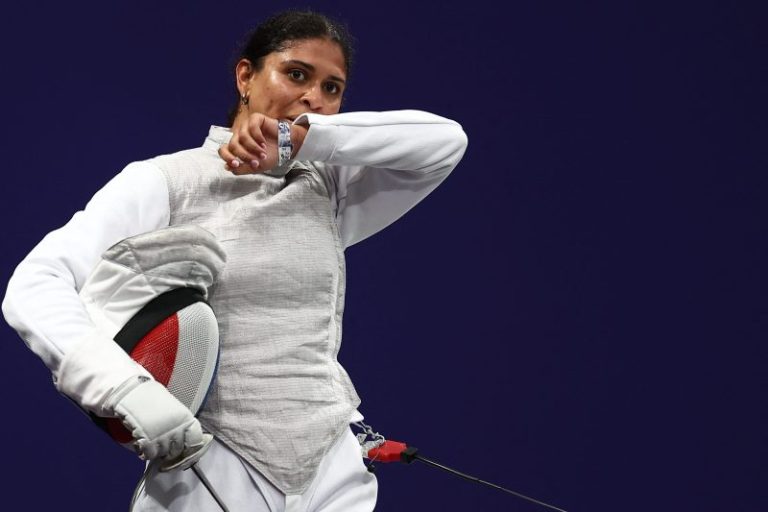 Fencer cleared after blaming doping positive test on kissing