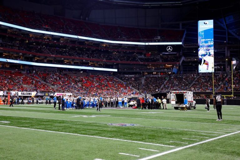 Lions player taken off field in ambulance, game suspended